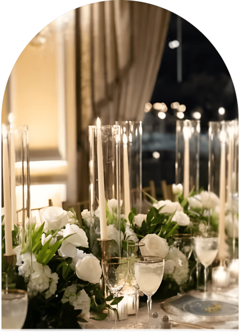 Elegant table setting with flowers and candles.