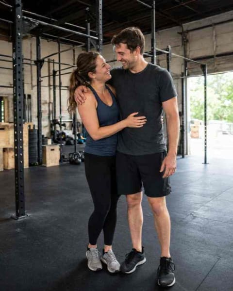 Couple training together at the gym.